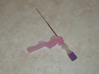 uncapped needle