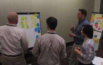 Team members Aaron Brown, Bob Sobehart, Marc Phan, and Chris Fowler
